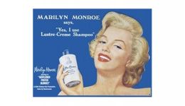 Monroe lustre creme tin sign
