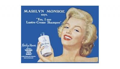 Monroe lustre creme tin sign
